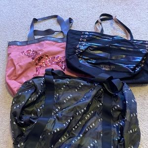 3 pink duffel bags